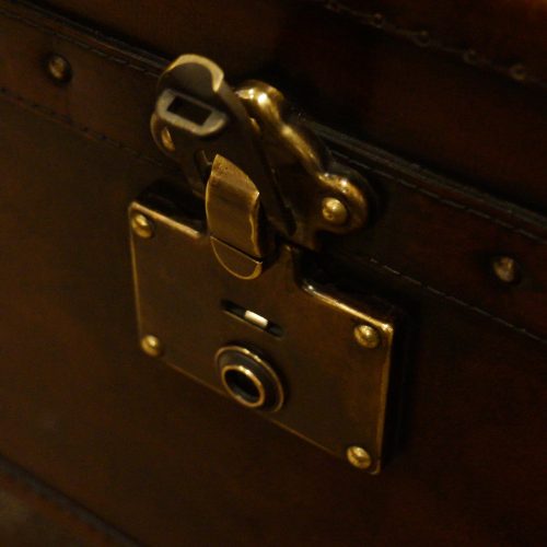 Leather trunk coffee table catch open