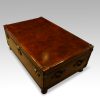 Leather trunk coffee table corner view