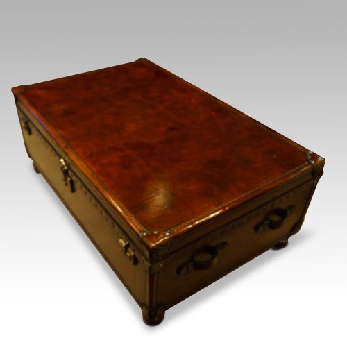 Leather trunk coffee table corner view