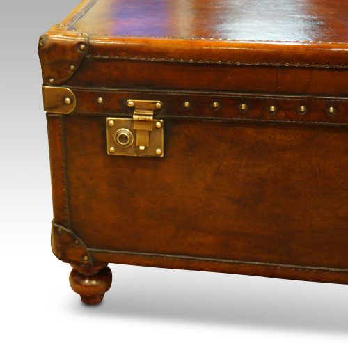 Leather trunk coffee table leg