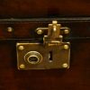 Leather trunk coffee table lock open