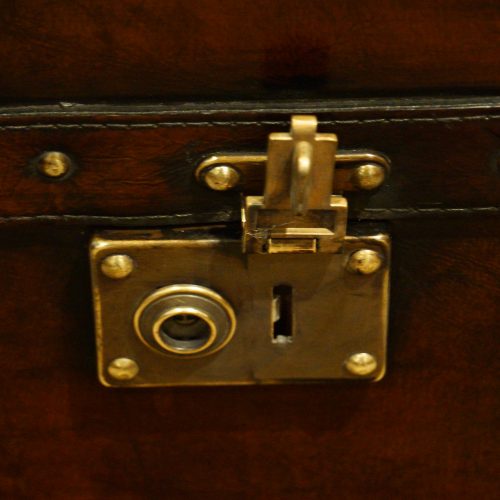 Leather trunk coffee table lock open
