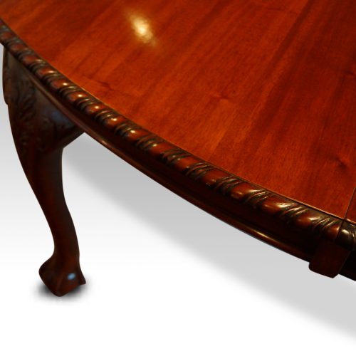Maple & co mahogany extending dining table carved edge detail