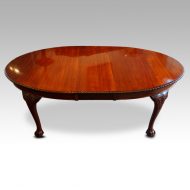 Maple & co mahogany extending dining table with one leaf