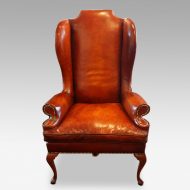 Queen Anne style high back leather wing chair