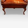 Queen Anne style high back leather wing chair apron