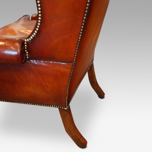 Queen Anne style high back leather wing chair back legs