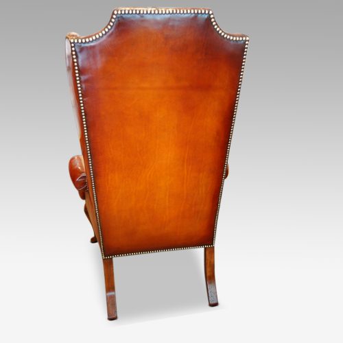 Queen Anne style high back leather wing chair rear