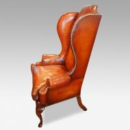 Queen Anne style high back leather wing chair side