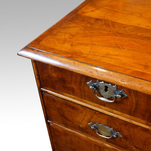 Queen Anne walnut chest with inlay detail