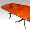 Regency style mahogany 12 seat dining table top end