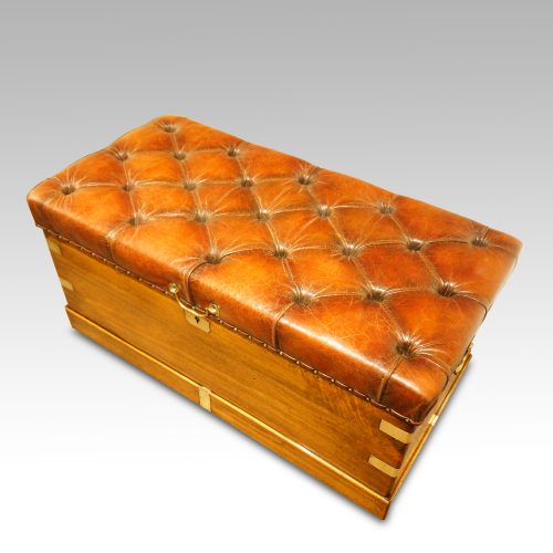Victorian camphorwood ottoman at angle