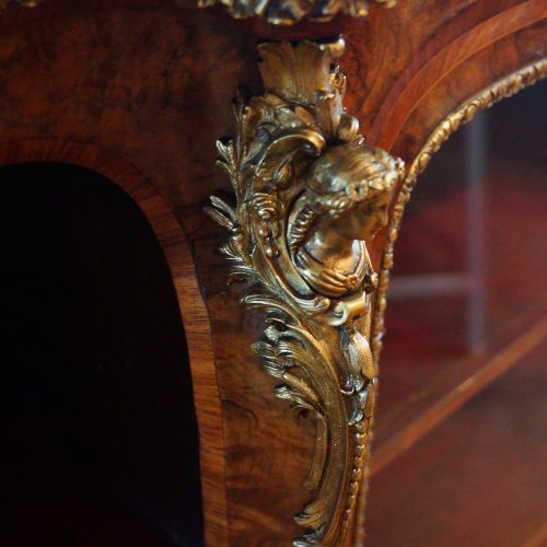 Victorian walnut open end credenza mount detail