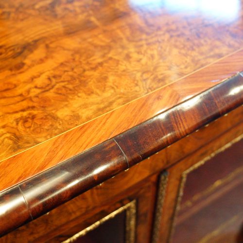 Victorian walnut open end credenza top detail