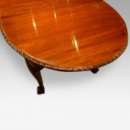 Waring and Gillow mahogany extending dining table bow end