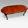 Waring and Gillow mahogany extending dining table detail