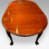 Waring and Gillow mahogany extending dining table end detail view