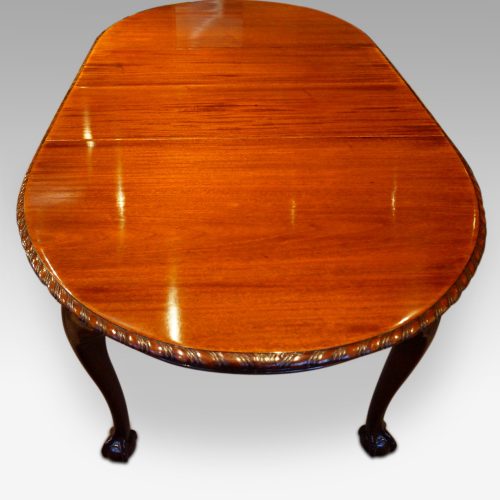 Waring and Gillow mahogany extending dining table end detail view