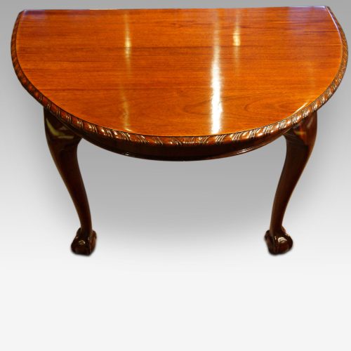 Waring and Gillow mahogany extending dining table end view