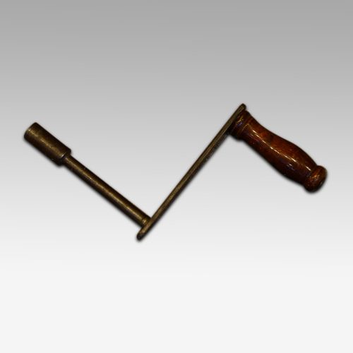 Waring and Gillow mahogany extending dining table handle