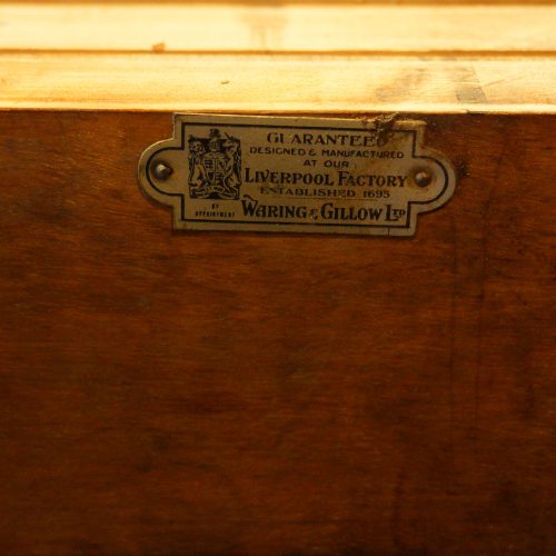 Waring and Gillow mahogany extending dining table label