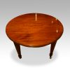 Edwardian circular mahogany dining table closed