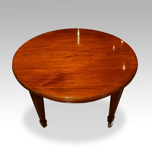 Edwardian circular mahogany dining table closed