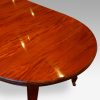 Edwardian circular mahogany dining table round end