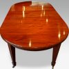 Edwardian circular mahogany dining table round end detail