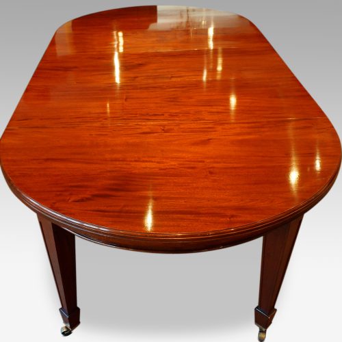 Edwardian circular mahogany dining table round end detail