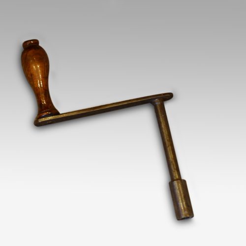 Edwardian circular mahogany dining table winding handle
