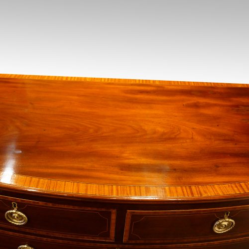 Georgian inlaid bow front chest top
