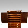 Georgian inlaid mahogany linen press interior