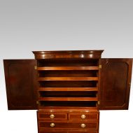 Georgian inlaid mahogany linen press interior