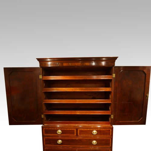 Georgian inlaid mahogany linen press interior