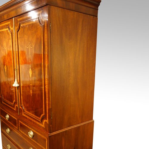 Georgian inlaid mahogany linen press side