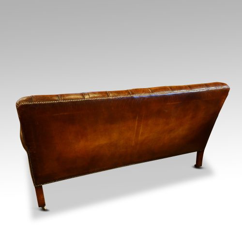Victorian leather Gentlemans club sofa rear view