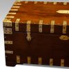 Antique brass bound campaign trunk corner