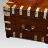 Antique brass bound campaign trunk end
