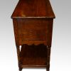 Antique oak potboard dresser base end view