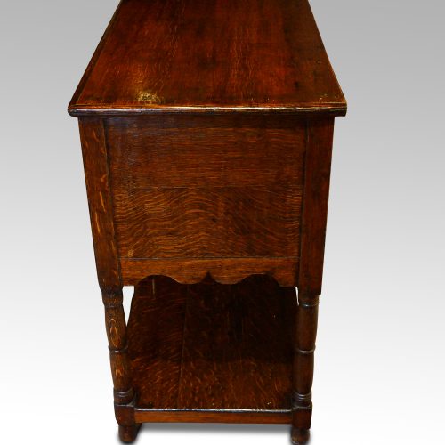 Antique oak potboard dresser base end view