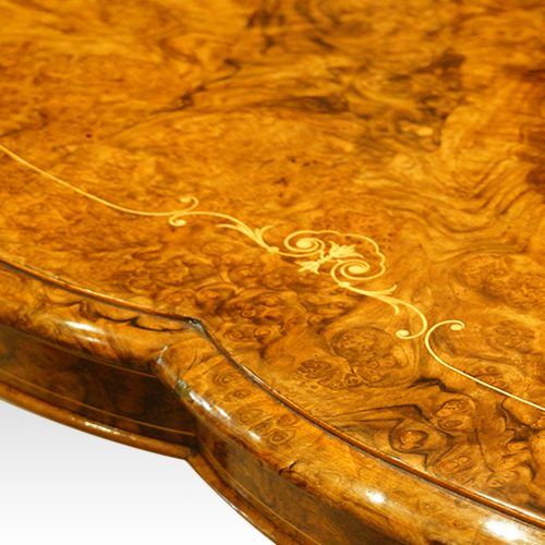 Victorian inlaid walnut shaped loo table edge