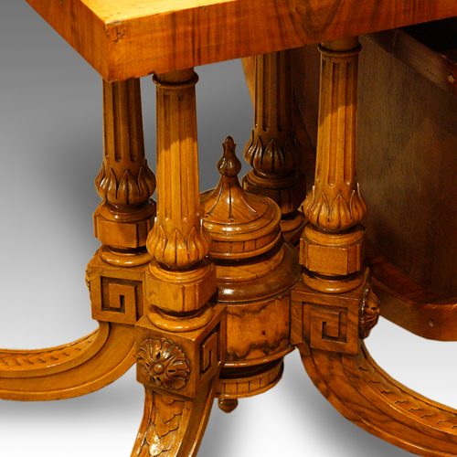 Victorian inlaid walnut shaped loo table columns
