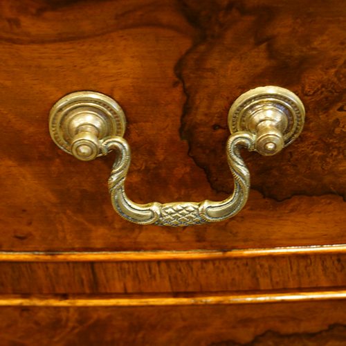 Walnut bow front dressing table handle