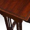 Edwardian mahogany nest of 4 tables corner