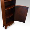 Mahogany open bookcase door open