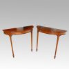 Pair Edwardian mahgany demi lune tables
