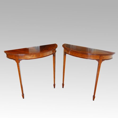 Pair Edwardian mahgany demi lune tables