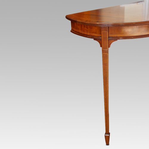 Pair Edwardian mahgany demi lune tables leg
