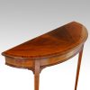 Pair Edwardian mahgany demi lune tables top (2)